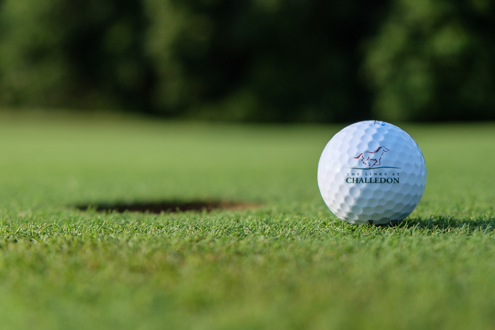 golf ball with course logo