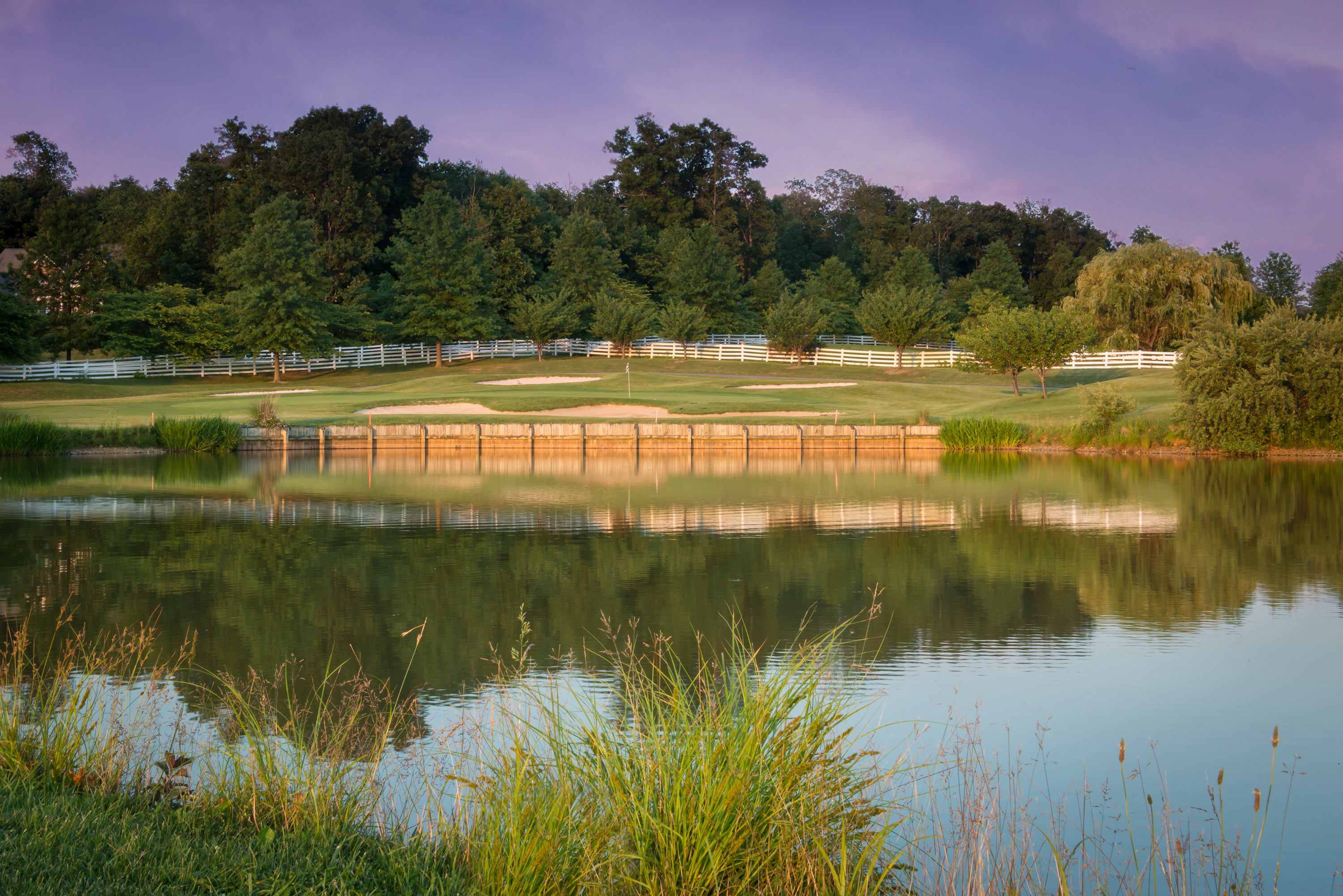 view of fairway and pond 