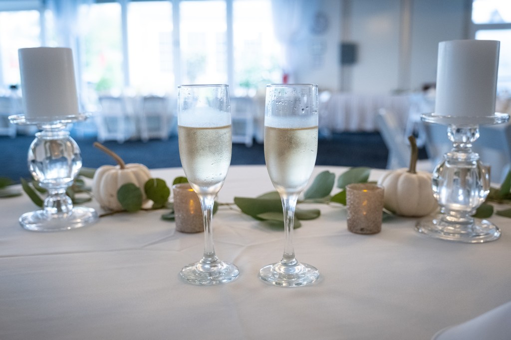 champagne glasses on reception table